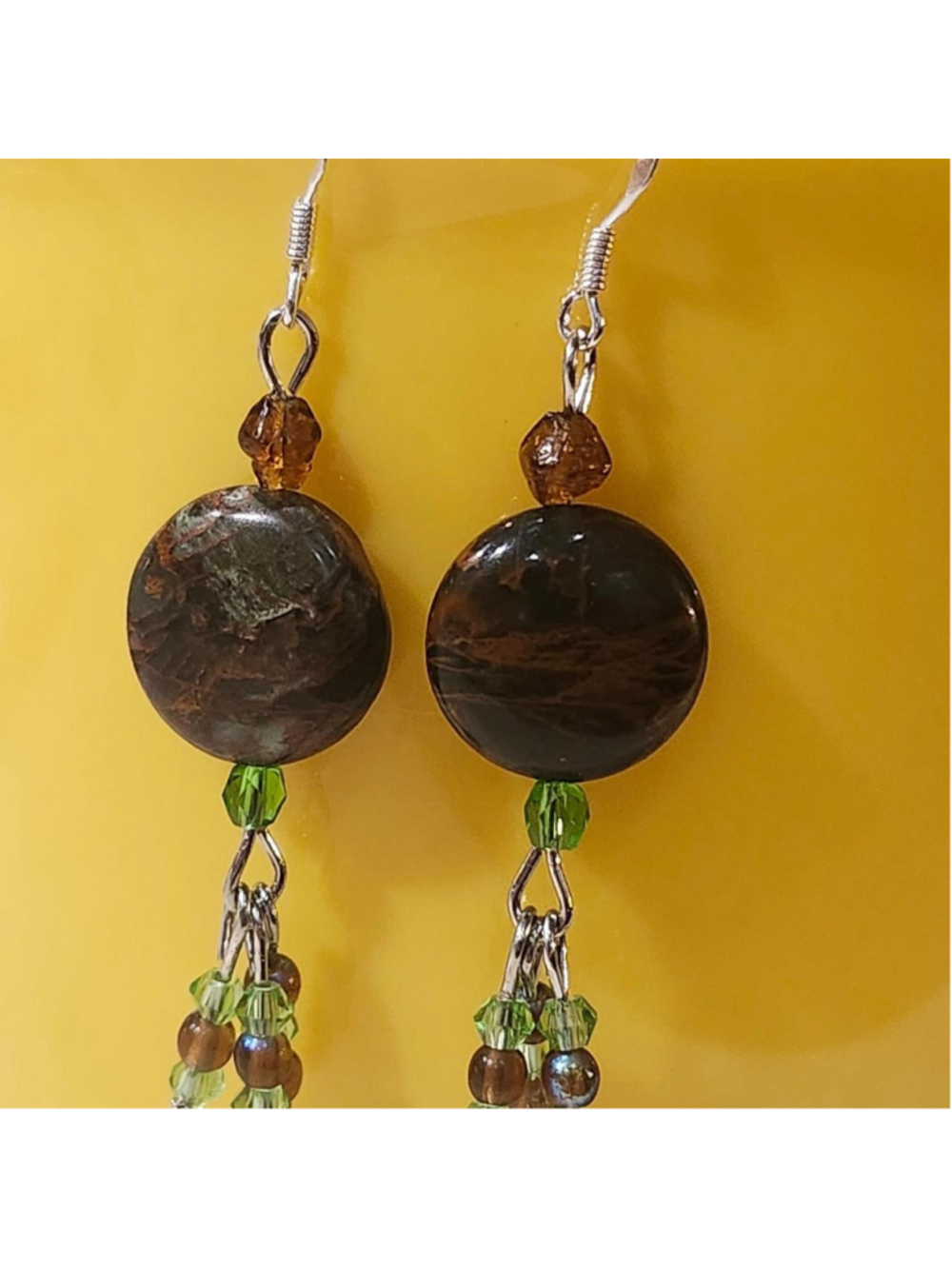 Handmade earrings with brown marbled beads and green beads #handmade #beaded